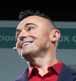 Rob Whitfield speaking on stage